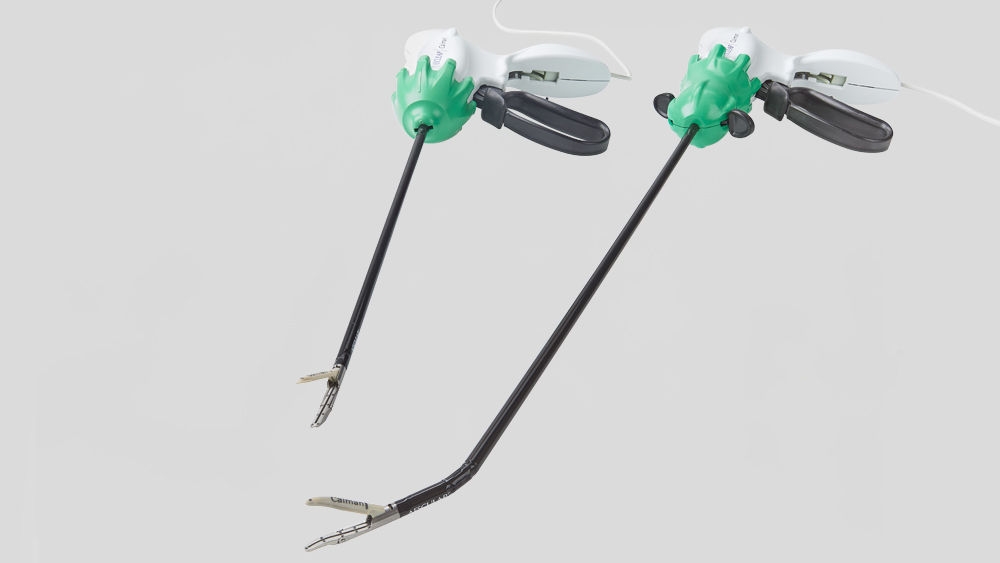 Two versions of the advanced bipolar surgical instrument AESCULAP Caiman® in working position with downward-pointing tips.